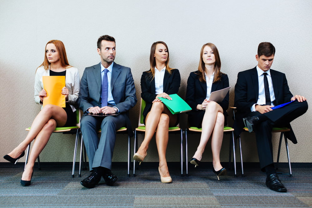 Serious Office Workers Contemplate Pay Transparency Act in Ontario
