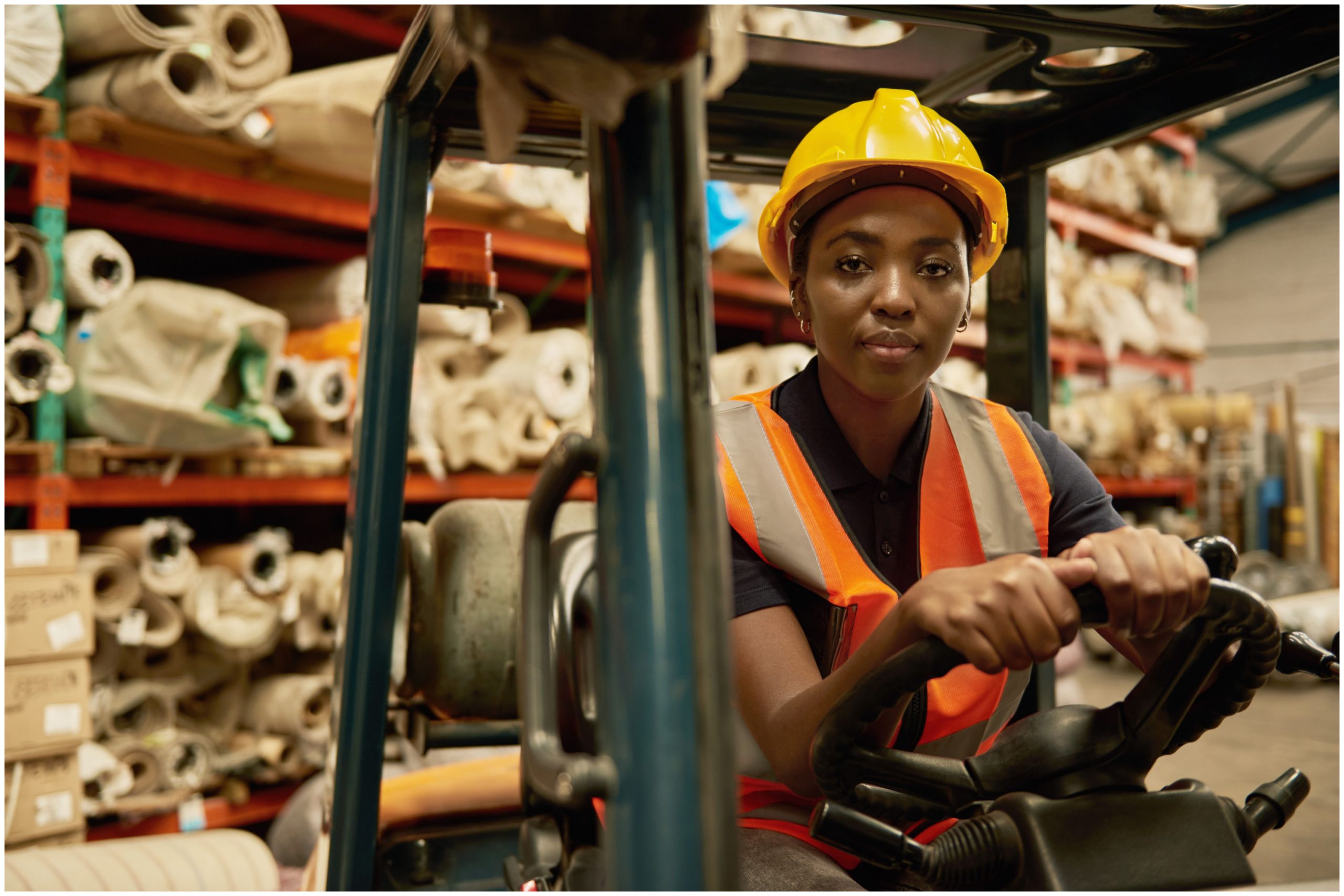 Woman driving a forklift